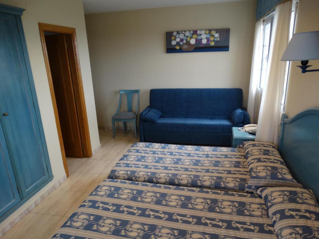 Habitación Doble Deluxe (2 adultos + 1 niño)